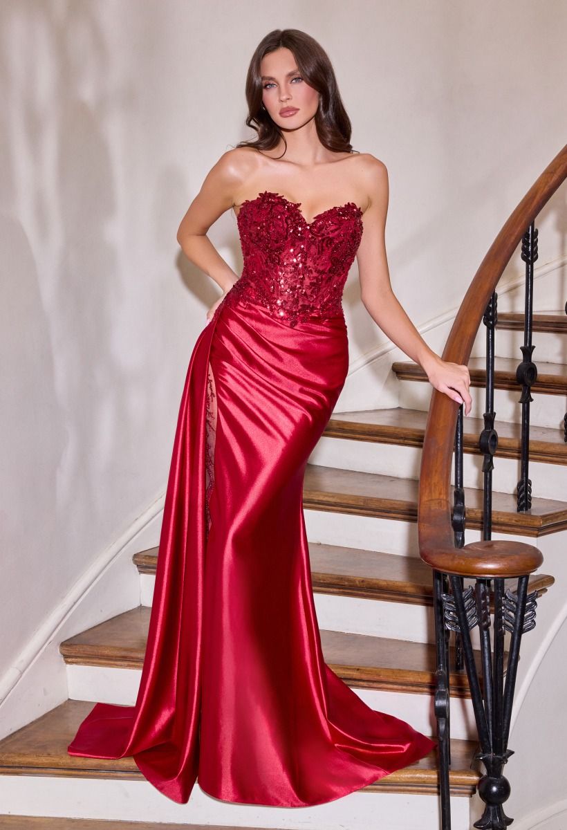 Elevate your prom night with the Ladivine CDS565, a stunning strapless gown designed to captivate. This exquisite dress features a sweetheart neckline and a sheer beaded corset bodice that creates an alluring silhouette. The intricate beadwork catches light beautifully, while the graceful train adds dramatic elegance as you move. Perfect for those seeking a show-stopping formal look that balances sophistication with glamour.

Silhouette:&nbsp;Fitted
Design:&nbsp;Sweetheart neckline, fully beaded bodice &amp