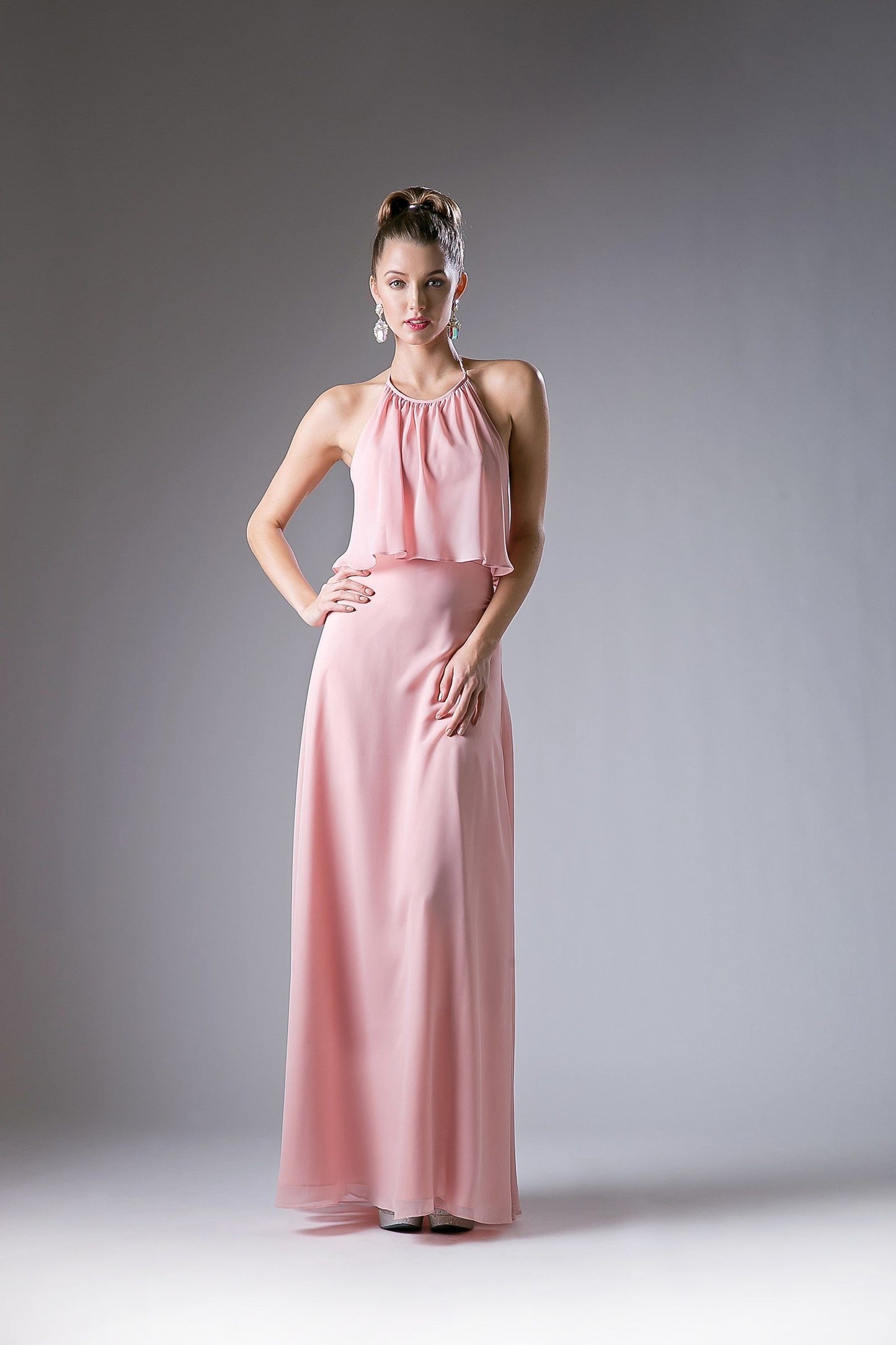 Elevate your wedding guest or bridesmaid look with the Ladivine CF130 gown in size 4. This blush-colored long dress features a sophisticated halter neckline and elegant ruffle draping that adds refined texture and flow. Designed to flatter with a graceful silhouette, it offers timeless style suitable for formal occasions. The delicate blush tone enhances softness and versatility, making this gown a polished choice for memorable events.

Size: S (4)

Color: Blush