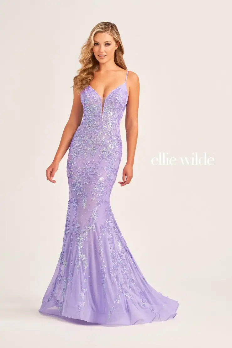 This Ellie Wilde EW35048 prom dress features a long, sheer bodice and stunning sequin detailing. The mermaid silhouette and plunging V-neckline create a flattering and glamorous look. Perfect for a formal event, this dress will make you stand out from the crowd.  Sizes: 00-16  Colors: Ice Blue, Hot Pink, Lavender, Navy Blue, Black