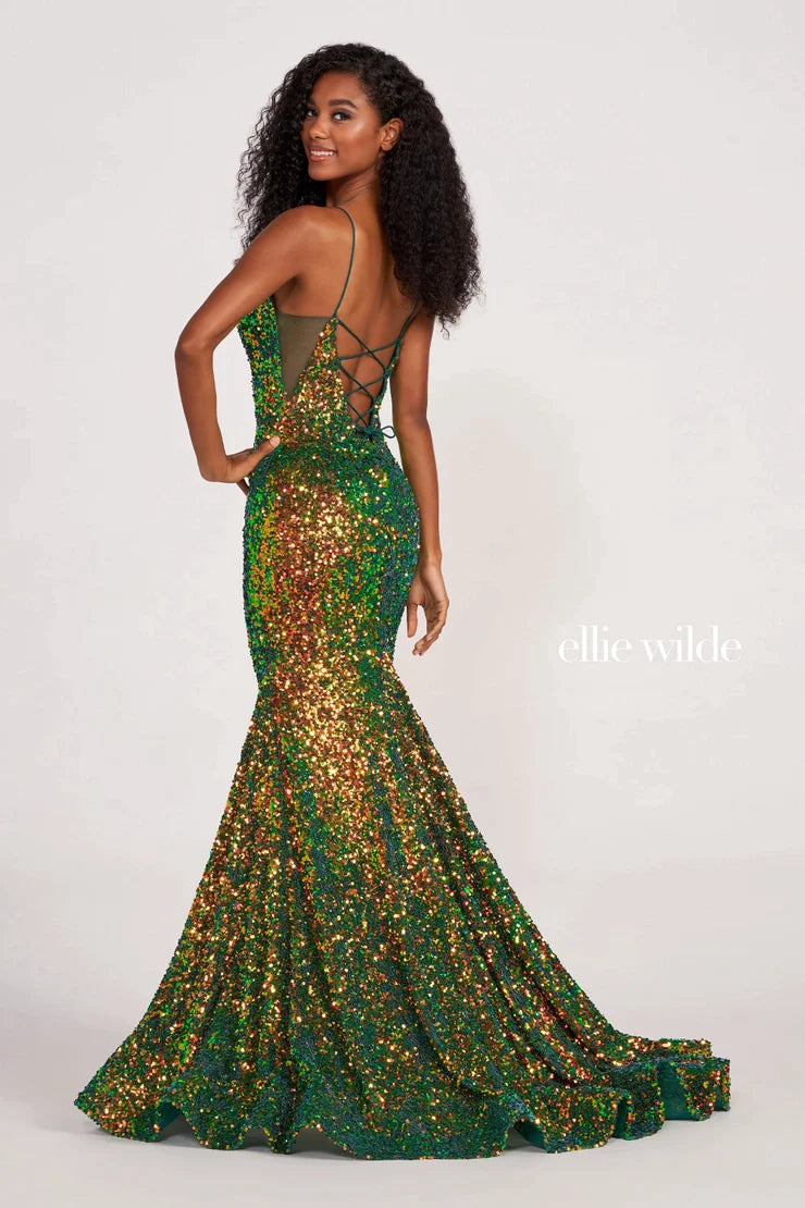 Look sophisticated and graceful in Ellie Wilde EW34016. The signature Iridescent color shifting sequins and mermaid silhouette make this timeless corset dress a perfect choice for a formal occasion. Captivate everyone in the room with its sparkling iridescent material and backless v-neckline.  Sizes: 16  Colors: FOREST LIGHT  https://dy9ihb9itgy3g.cloudfront.net/static/themes/EllieWilde/Spring_2023/EW34016.mp4