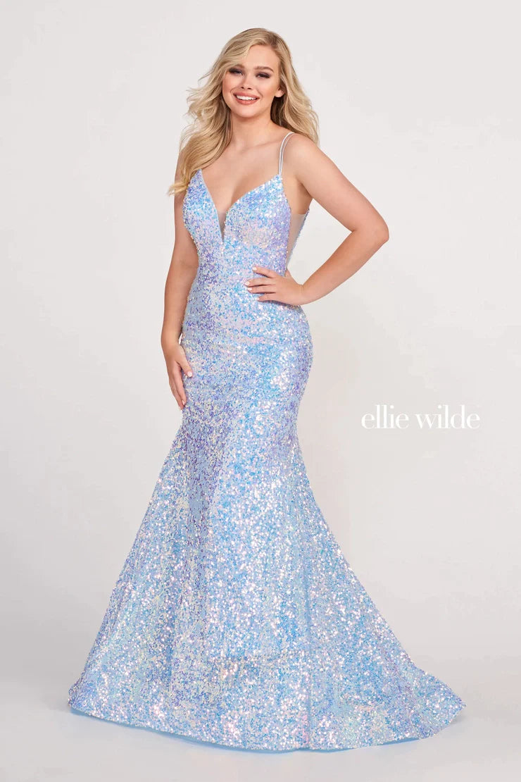 Look sophisticated and graceful in Ellie Wilde EW34016. The signature Iridescent color shifting sequins and mermaid silhouette make this timeless corset dress a perfect choice for a formal occasion. Captivate everyone in the room with its sparkling iridescent material and backless v-neckline.  Sizes: 8  Colors: IRIS  https://dy9ihb9itgy3g.cloudfront.net/static/themes/EllieWilde/Spring_2023/EW34016.mp4