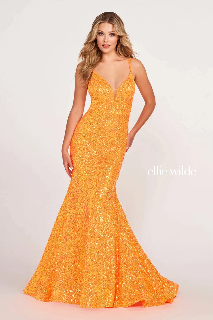 Look sophisticated and graceful in Ellie Wilde EW34016. The signature Iridescent color shifting sequins and mermaid silhouette make this timeless corset dress a perfect choice for a formal occasion. Captivate everyone in the room with its sparkling iridescent material and backless v-neckline.  Sizes: 8  Colors: IRIS  https://dy9ihb9itgy3g.cloudfront.net/static/themes/EllieWilde/Spring_2023/EW34016.mp4