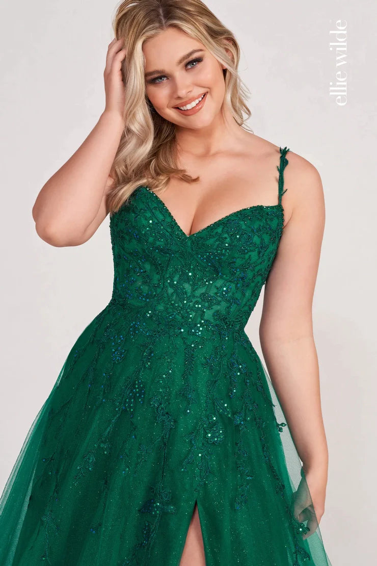 Discover a stunning combination of sheer lace shimmer and A-line silhouette with the Ellie Wilde EW34116 Prom Dress. Highlight your figure with a daring maxi slit, perfect for a formal event. This gown exudes elegance and sophistication, making you stand out amongst the crowd. Turn heads in this must-have dress.