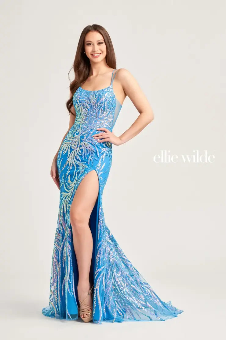 Make a statement in this Ellie Wilde EW35046 prom dress. Featuring a sheer sequin design, slit, scoop neck, backless corset, and formal gown style. With its elegant and unique features, this dress is perfect for any formal occasion. Shine and stand out in this stunning dress.  Sizes: 00-16  Colors: MAGENTA, ULTRA VIOLET, CERULEAN BLUE