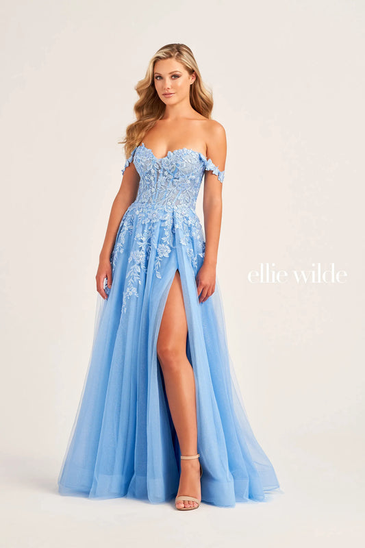 Be the belle of the ball in this Ellie Wilde  EW35101 Sheer Lace Corset Prom Dress. Featuring glitter tulle, sequin tulle, and lace appliqués, this A-line gown boasts a sweetheart neckline and off-the-shoulder sleeves. The front slit and 3D flower lace strap add extra flair to this elegant and glamorous look.  Sizes: 00-24  Colors: RED, LIGHT YELLOW, EMERALD, ROYAL BLUE, BLUEBELL