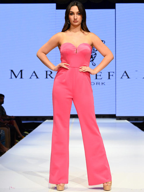 This Marc Defang 8171 Strapless Pageant Jumpsuit Satin Sweetheart Formal offers a sophisticated look and feel. Its black and pink coloring, strapless design and satin sweetheart bodice are perfect for any special occasion. Featuring a fitted waistband and full-length legs, this elegant jumpsuit will flatter and fit any body type.  Sizes: 00-16  Colors: Yellow/Royal Blue, Hot Pink/Black, Hot Pink