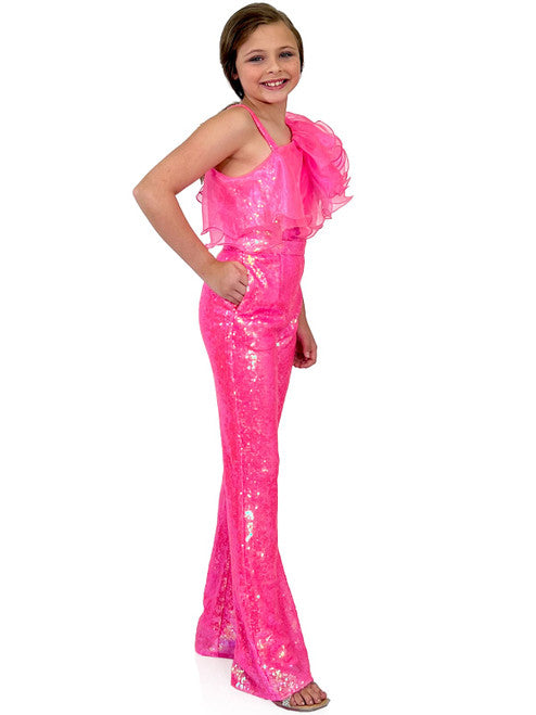 Marc Defang 5026 Girls Sequin One Shoulder Pageant Jumpsuit Ruffle Fun Fashion  Multi layer organza ruffles at neck Fully beaded jumpsuit One side off shoulder design with strap on the other side  Sparkle Iridescent colors  Center Back invisible zipper Knitted inner comfort lining Available Sizes: 4-14  Available Colors: White, Orange, Black, Royal Blue, Fuchsia