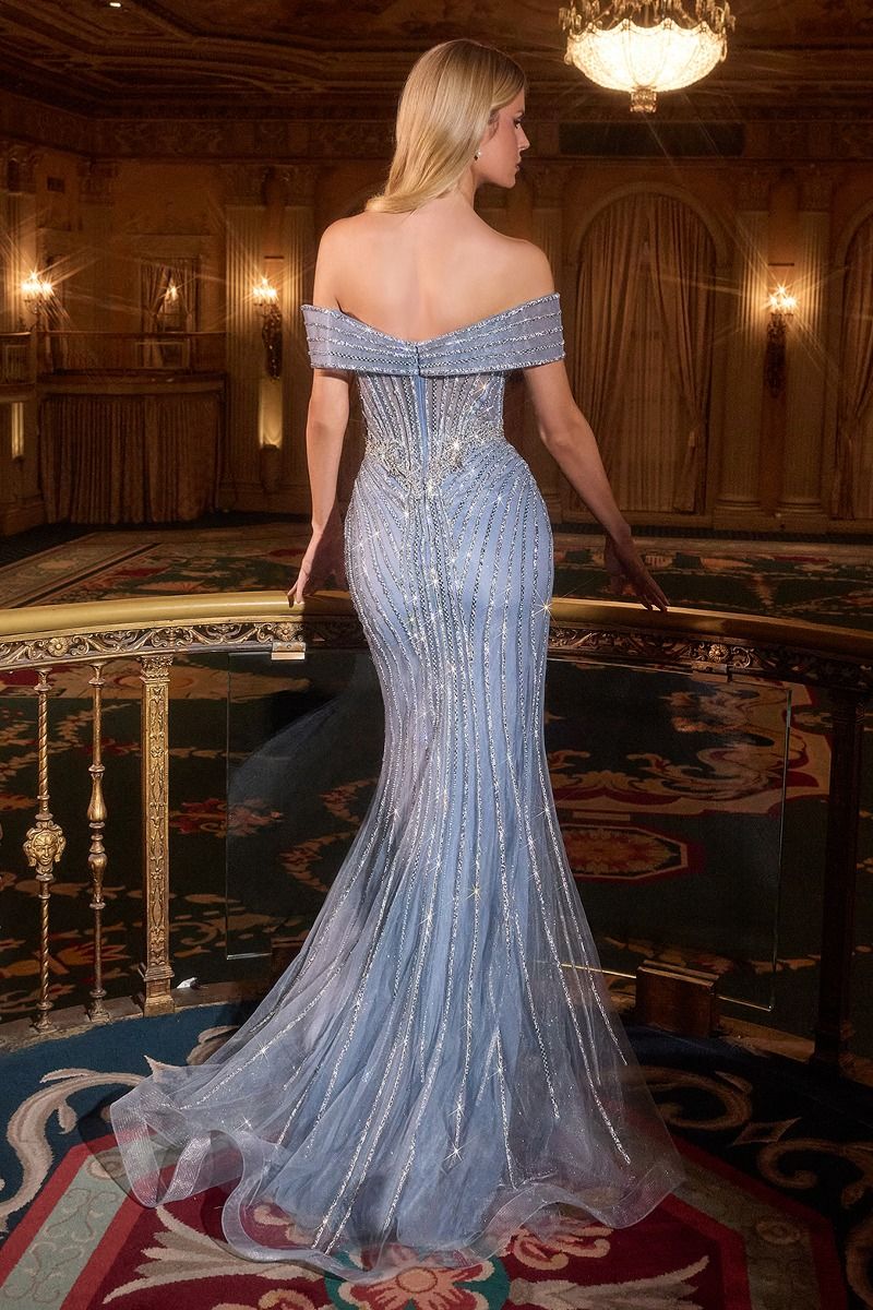 Ladivine KV1130 Off-the-Shoulder Sheer Corset Prom Dress features a striking plunging sweetheart neckline and elegant mermaid silhouette that commands attention. The sheer corset bodice provides structured support with a modern edge, while off-the-shoulder styling adds timeless sophistication. A dramatic train completes the look, making this gown ideal for prom, formal events, or red-carpet moments. Crafted for those seeking a bold, glamorous statement piece that balances sensuality with refined elegance.

