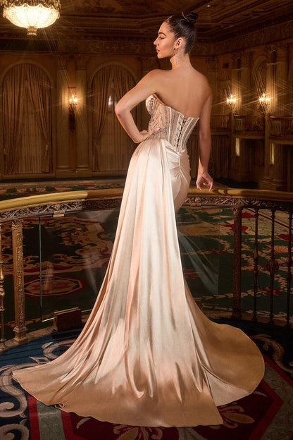 Elevate your formal look with the Ladivine KV1131, a masterfully designed prom dress featuring a crystal-embellished corset that provides a striking focal point. The elegant cowl neck enhances sophistication, while the overskirt with a daring slit adds dynamic movement and a modern edge. Perfect for evening events, this gown combines timeless glamour with contemporary details for a confident and unforgettable appearance.&nbsp;

Radiate elegance in this fitted gown, designed with a strapless sweetheart neckl