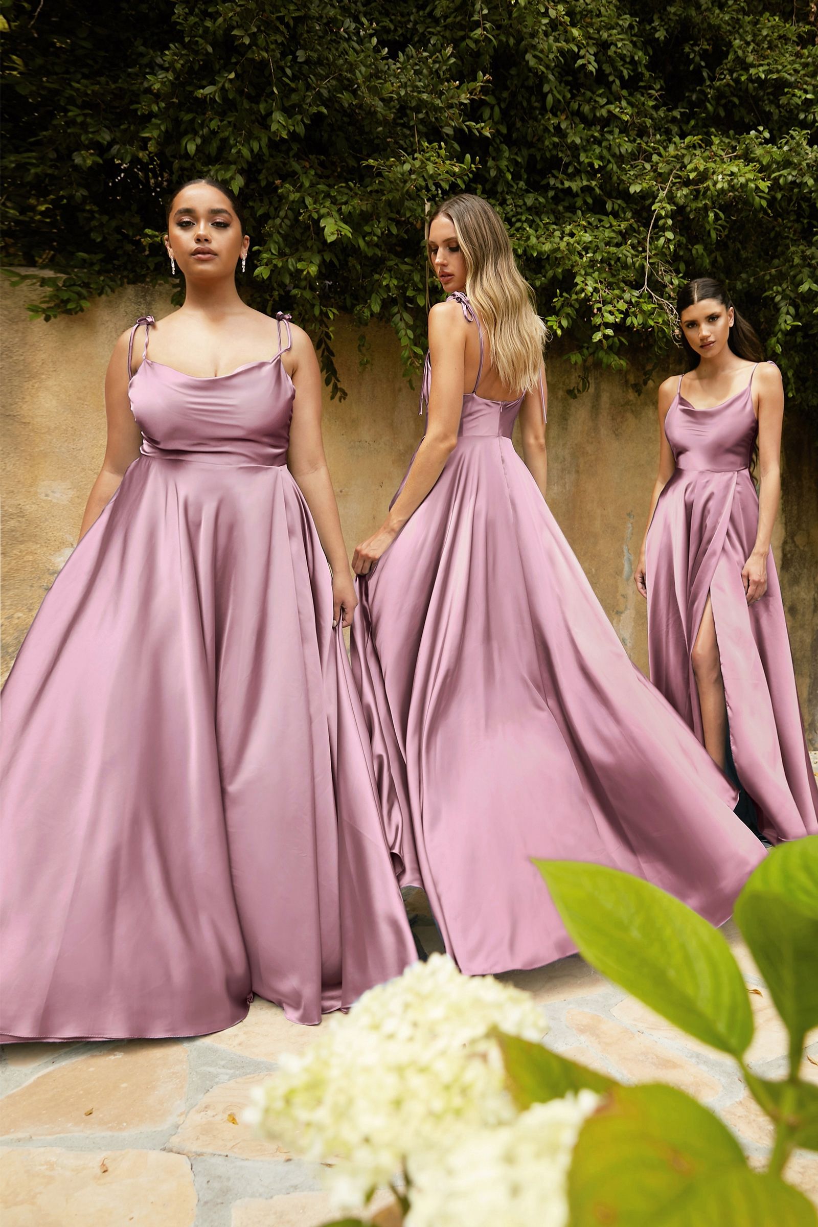 Ladivine BD104 Bridesmaid dress satin A line scoop necklineThe Ladivine BD104 Bridesmaid Dress offers a timeless look with its classic A-line silhouette and scoop neckline. Made from luxurious satin, the dress features a chic slit detail that allows you to create the perfect evening look. Perfect for any special occasion, this dress is sure to make an impression.