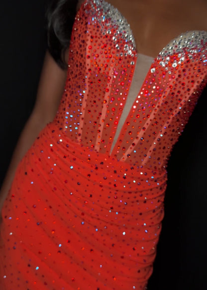 Elevate your evening with the Ashley Lauren 4877, a short fitted cocktail gown designed to captivate. Featuring a sheer crystal corset and a flattering V-neckline, this homecoming dress combines elegance with a modern edge. Its tailored silhouette enhances your figure, making it perfect for memorable occasions where sophistication is key.&nbsp;Shine bright in the ASHLEYlauren Style 4877, a dazzling press-on fabric mini dress featuring an ombre effect with beaded detailing on the bust and body. This sweethea