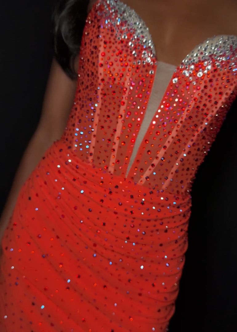Elevate your evening with the Ashley Lauren 4877, a short fitted cocktail gown designed to captivate. Featuring a sheer crystal corset and a flattering V-neckline, this homecoming dress combines elegance with a modern edge. Its tailored silhouette enhances your figure, making it perfect for memorable occasions where sophistication is key.&nbsp;Shine bright in the ASHLEYlauren Style 4877, a dazzling press-on fabric mini dress featuring an ombre effect with beaded detailing on the bust and body. This sweethea