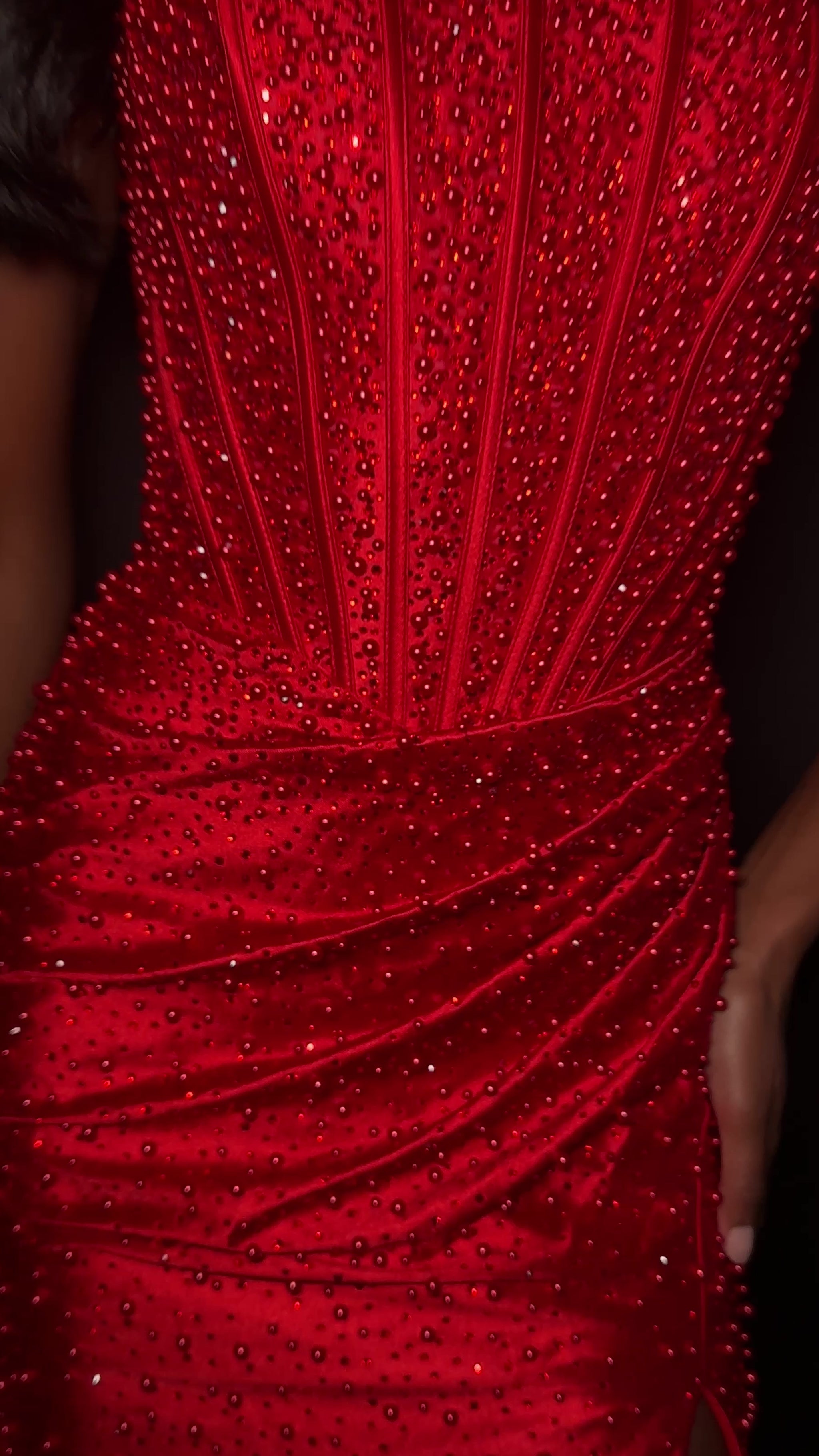 ASHLEYlauren Style 12356 is a fully beaded evening gown that commands attention with its fitted silhouette and strapless neckline.&nbsp; Ashley Lauren 12356 The expertly contoured bodice features vertical beadwork that accentuates the waist and elongates the figure, while a sweeping train with slit adds dramatic movement. Crafted from jersey fabric with pearl corset bustier detailing, this gown delivers high-impact sparkle from every angle. Ideal for pageants, red carpet events, prom, galas, and special occ