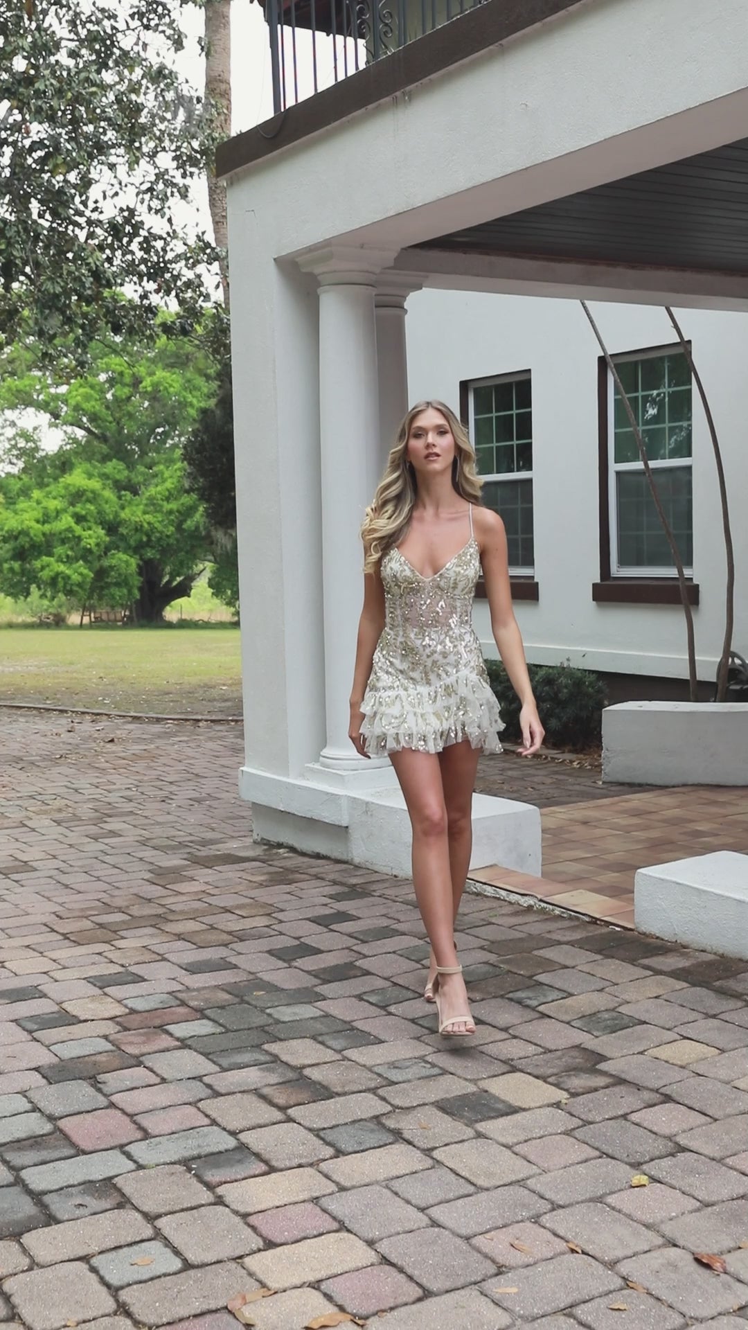 The Primavera Couture 4401 is a stunning short fit-and-flare homecoming dress designed to make you feel confident and elegant. Featuring a sheer beaded bodice with a flattering corset, it offers both support and style. The playful ruffle skirt adds movement and charm, perfect for dancing the night away. This cocktail gown combines sophistication with youthful flair, ensuring you stand out at any special event.

Sizes: 000-18

Colors: Black, Pink, Lavender, Ivory/Gold