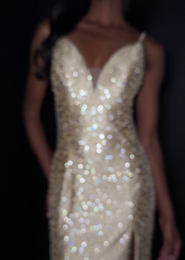 Ashley Lauren Style 12155 is a long prom dress designed for pageant and formal evening events. This elegant Pearl gown features Ashley Lauren's signature attention to fit and detail, creating a flattering silhouette that stands out on stage and in photos.