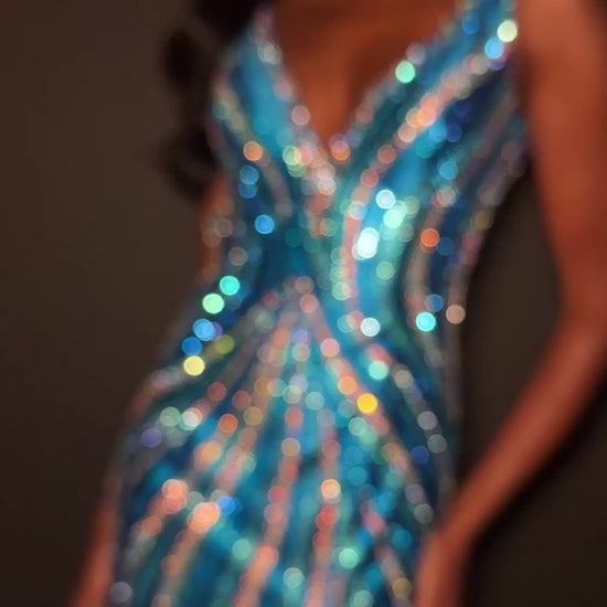 Make a statement in ASHLEYlauren Style 12253. This fully beaded evening gown features a flattering v-neckline and fitted silhouette. The heat set stone pattern creates a stunning swirl effect that accentuates your curves. The look is finished with a high slit and low open back for added drama.

Available in Champagne, Emerald, Gold, Ocean, Pink, Purple, Red, Royal
Ideal for Prom, Formal Galas, Special Occasions, Pageant Competitions and Red Carpet Events.
Featuring a V-Neckline, High Slit, and Open Back

As