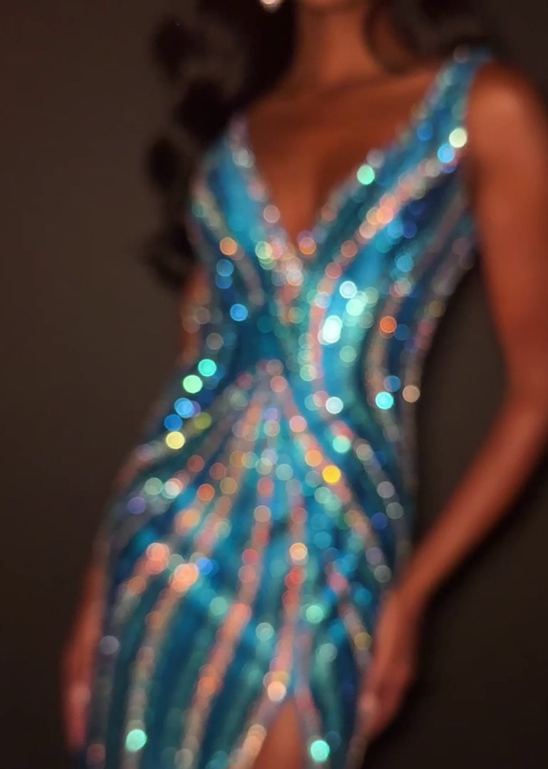 Make a statement in ASHLEYlauren Style 12253. This fully beaded evening gown features a flattering v-neckline and fitted silhouette. The heat set stone pattern creates a stunning swirl effect that accentuates your curves. The look is finished with a high slit and low open back for added drama.

Available in Champagne, Emerald, Gold, Ocean, Pink, Purple, Red, Royal
Ideal for Prom, Formal Galas, Special Occasions, Pageant Competitions and Red Carpet Events.
Featuring a V-Neckline, High Slit, and Open Back

As
