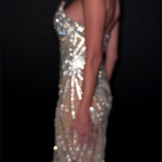 Ashley Lauren Style 12011 is a long prom dress designed for pageant and formal evening events. This elegant gown features Ashley Lauren's signature attention to fit and detail, creating a flattering silhouette that stands out on stage and in photos.

Available Colors: Silver, Gold, Red