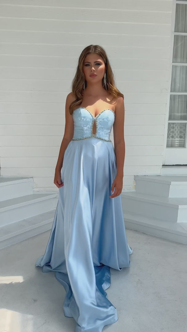 This Ava Presley 39236 long prom dress features a sweetheart neckline and intricate beaded detailing on luxurious satin for a sophisticated and elegant look. Perfect for formal events and pageants, this gown will make you feel like a true beauty queen.
