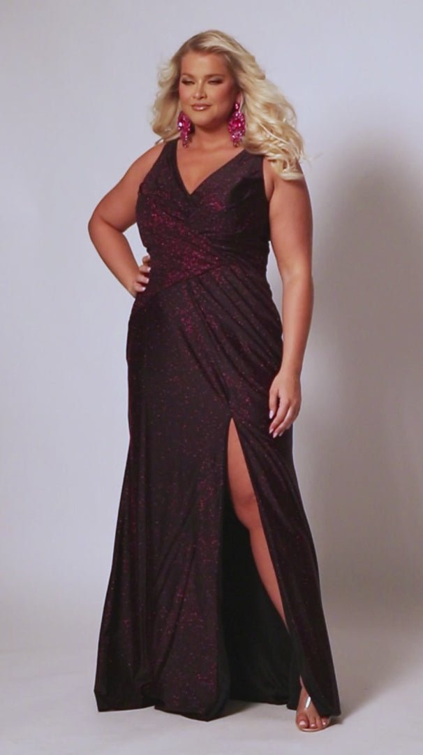 Sydneys Closet SC7376 offers a fitted plus size formal gown featuring a flattering V-neck, maxi slit skirt, and train detail for an unforgettable look. Perfect for prom or pageants. Look effortlessly elegant as a formal wedding guest or for any fancy evening that awaits you in the Late Night Sparkle plus size simple maxi dress. 