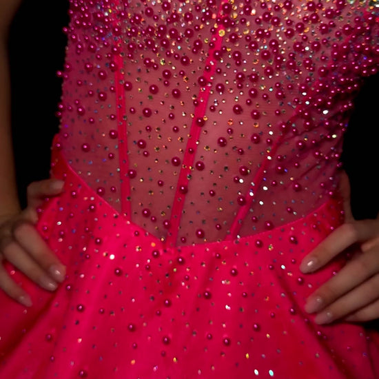 Elevate your evening with the Ashley Lauren 4927, a short flared cocktail gown that blends elegance and modern charm. Featuring a sheer beaded corset bodice, this dress offers a delicate sparkle that enhances your silhouette. Crafted from smooth satin, its flared skirt adds graceful movement, perfect for homecoming or special occasions. This gown combines&nbsp; refined details with a flattering fit to ensure you stand out with timeless sophistication.&nbsp; Stand out at any formal or cocktail event with ASH