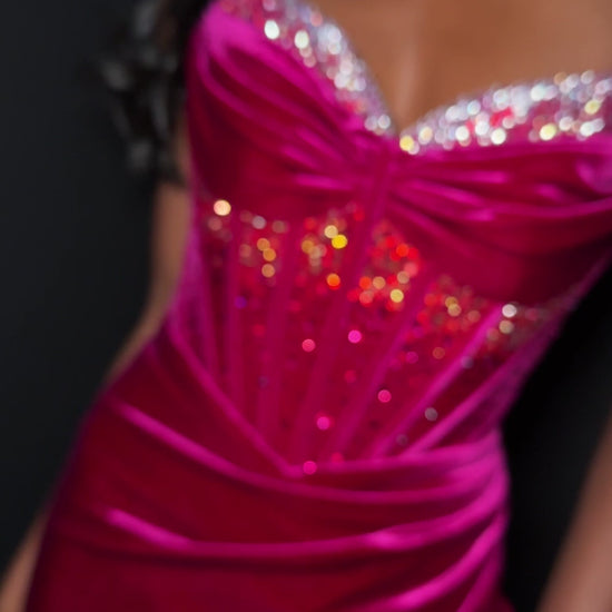 Elevate your evening with the Ashley Lauren 4865, a short fitted velvet corset dress designed to captivate. Featuring a pointed V-neck and a crystal-embellished slit, this cocktail gown combines elegance with a touch of allure. Its luxurious velvet fabric and structured corset silhouette ensure a flattering fit, perfect for homecoming or any special occasion where sophistication is key.&nbsp; Make a striking entrance in ASHLEYlauren Style 4865, a velvet mini dress featuring a beaded corset bodice with a swe