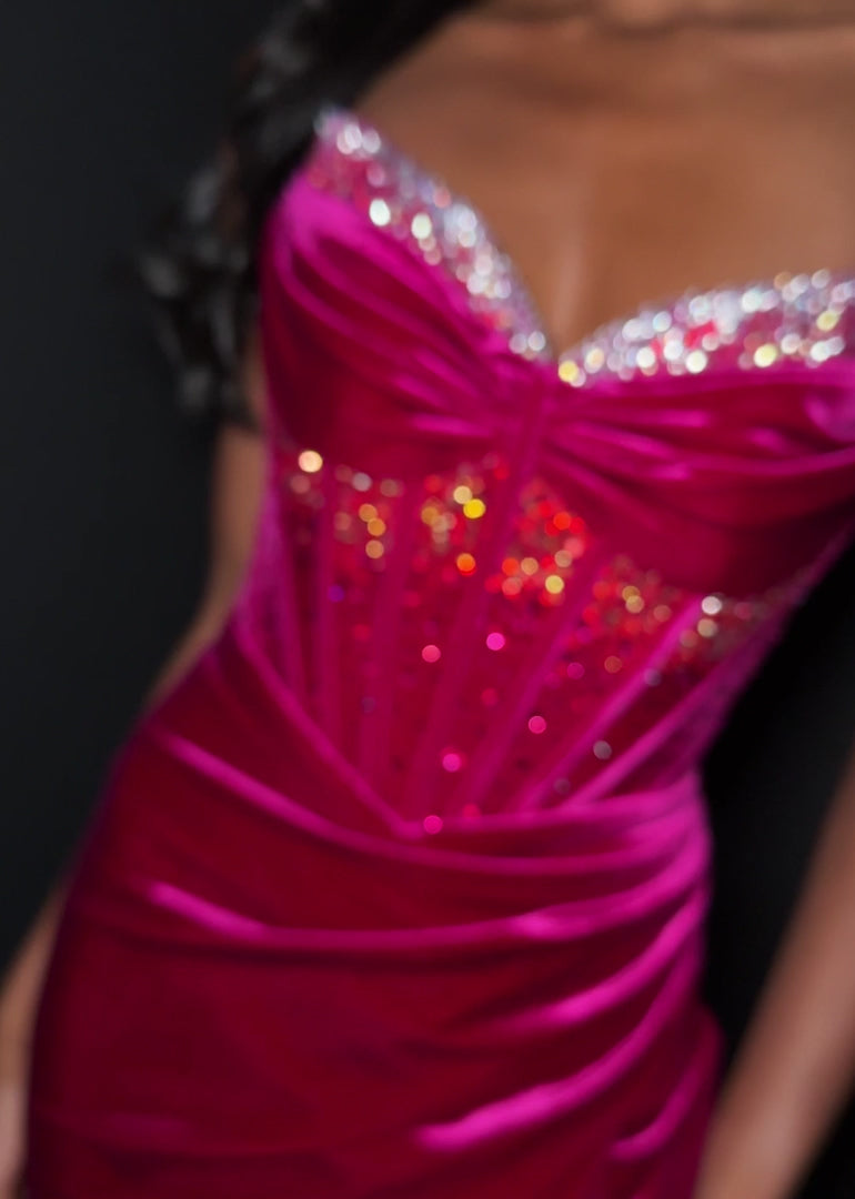 Elevate your evening with the Ashley Lauren 4865, a short fitted velvet corset dress designed to captivate. Featuring a pointed V-neck and a crystal-embellished slit, this cocktail gown combines elegance with a touch of allure. Its luxurious velvet fabric and structured corset silhouette ensure a flattering fit, perfect for homecoming or any special occasion where sophistication is key.&nbsp; Make a striking entrance in ASHLEYlauren Style 4865, a velvet mini dress featuring a beaded corset bodice with a swe