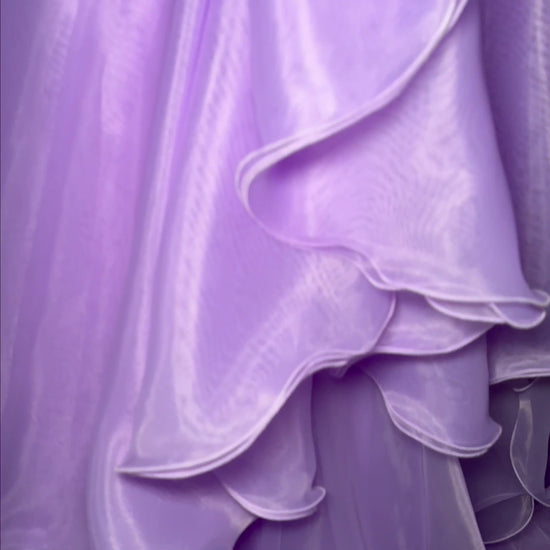 Get ready to make a statement at your next formal event with the Ashley Lauren 11601 Long Prom Dress. This elegant gown features a stunning organza ruffle side overskirt with a daring slit, perfect for showing off your legs. Complete with a formal pageant-worthy design, you'll be sure to turn heads all night long. An overskirt that is here to slay! This fabulous ruffle organza side overskirt is sure to look incredible with your next look. Pair it with your favorite ASHLEYlauren dress, jumpsuit or cocktail.