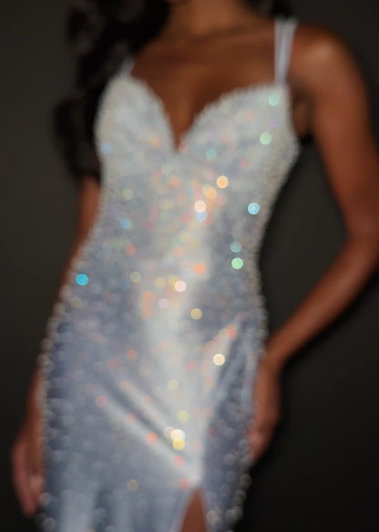 Ashley Lauren 12357 Make an entrance in ASHLEYlauren Style 12357 pearl crystal prom dress. This gown features full pearl beading, a fitted silhouette, lace up back and sleek sweetheart neckline. The vertical beadwork accentuates the waist and elongates the figure.