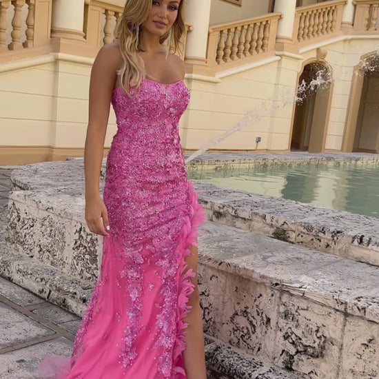 Introducing the exquisite Ava Presley 38924 Long Prom Dress. Our strapless gown features intricate beaded lace and a chic slit, beautifully accentuated by feather trim. Perfect for formal events and pageants, this dress exudes elegance and sophistication. Feel confident and glamorous in this stunning piece.