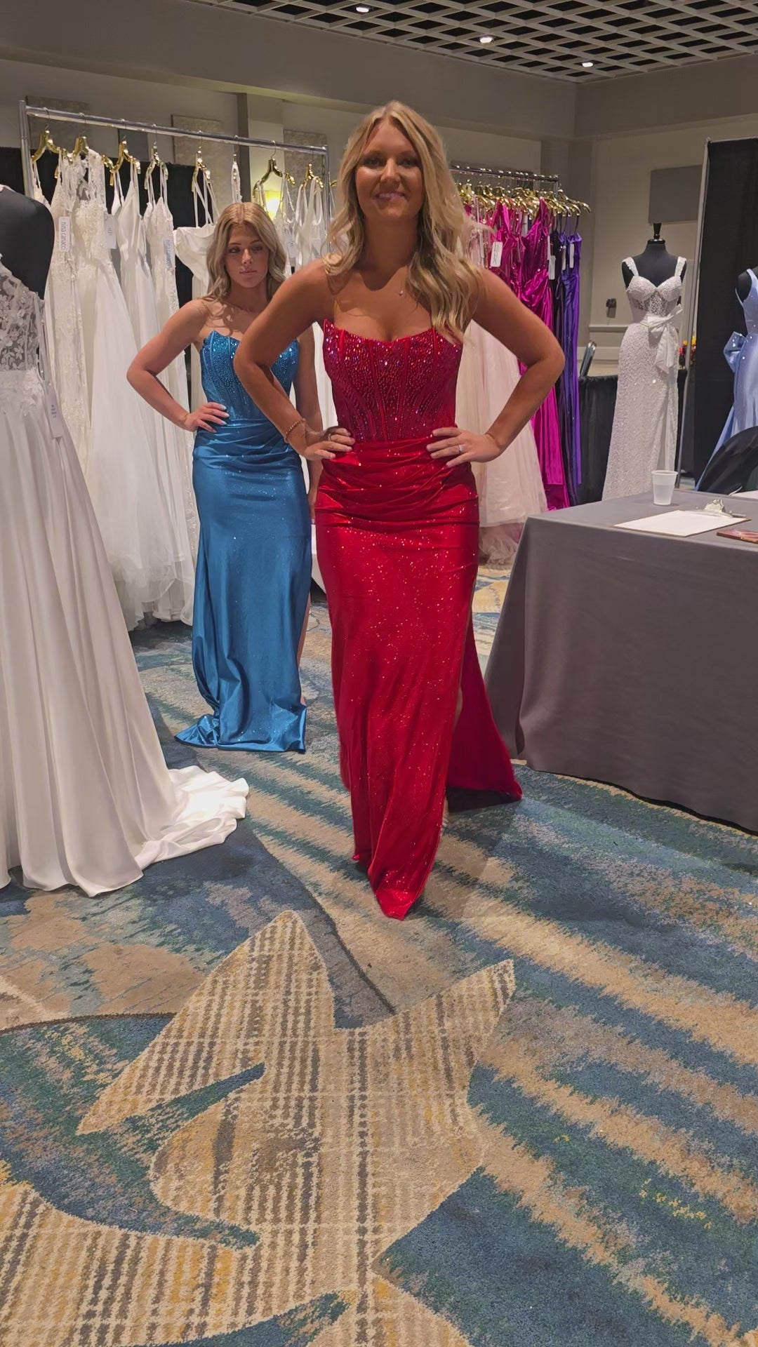 Elevate your prom night with the Nina Canacci style 1605 Crystal Corset Prom Dress. This stunning formal gown features a sheer crystal-embellished corset bodice that commands attention, paired with a luxuriously ruched jersey skirt. The strapless design showcases a graceful scoop neckline, while a dramatic side slit adds movement and sophistication. Perfect for those seeking timeless elegance with modern glamour.

Sizes: 0-10

Colors: Red, Teal, Black
