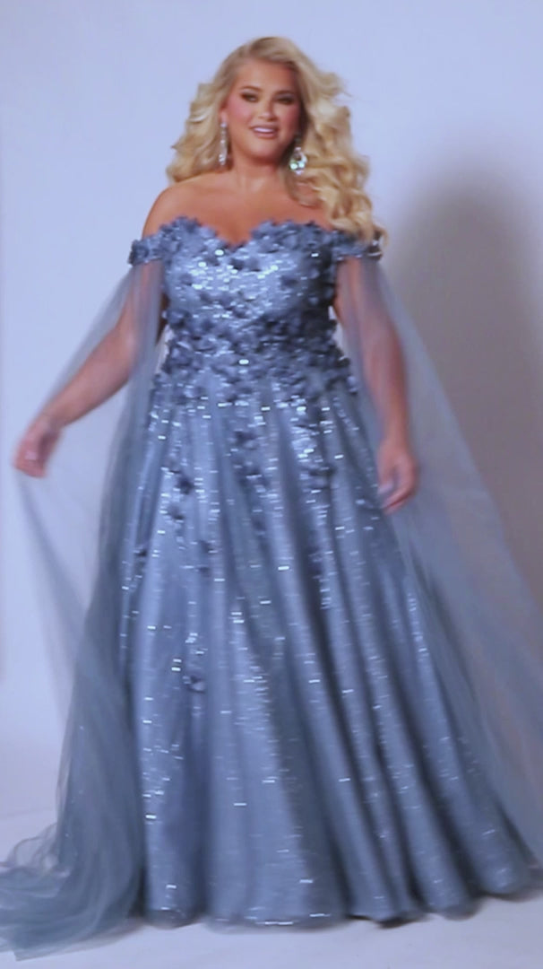 This glamorous Sydneys Closets SC7379 prom dress features an off-shoulder, sweetheart neckline and a fitted silhouette adorned with 3D floral details. The elegant design is perfect for a formal occasion such as a prom, pageant, or wedding. Plus size options are available for an ideal fit. Look and feel  like royalty at Prom 2024 or any formal ball when you opt to be lady who wears our "Dream On" gown.
