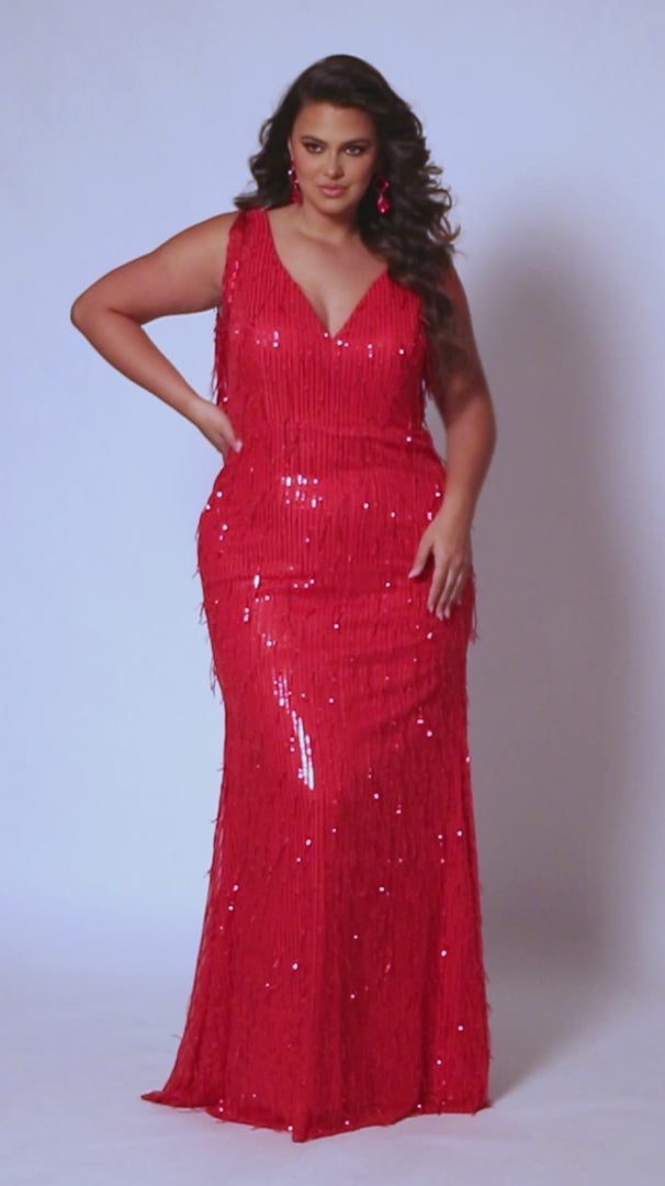 Enchanting sequin fringe cascades down the bodice of this plus size pageant dress. Its fitted silhouette and flattering V neckline provide an eye-catching look that is sure to turn heads. Perfect for your next formal event! Look glamourous at your next big fancy event when you arrive wearing our Spur of the Moment plus size fringe evening gown. Classic sequin slim formal dress updated with trendy fringe embellishment on the fitted bodice and fitted skirt for a very playful embellishment. 