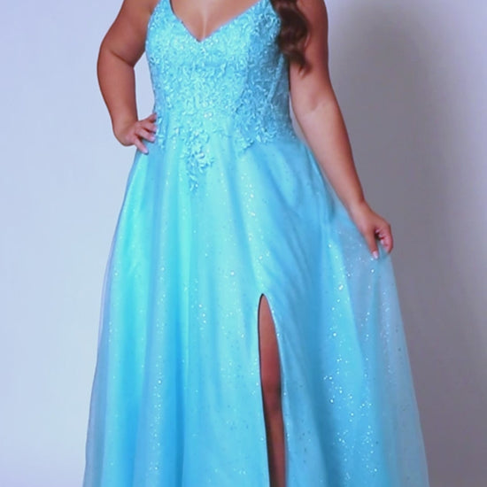 Look stunning at any formal event in a Sydneys Closet SC7384 Long Prom Dress. This A-line prom gown features a V-neckline with a scoop back, slit, pockets and a floor-length skirt complete the look. Ideal for plus size formal occasions. Pump up the fun factor at Prom 2024 when you arrive wearing this sparkly Aline evening dress. 