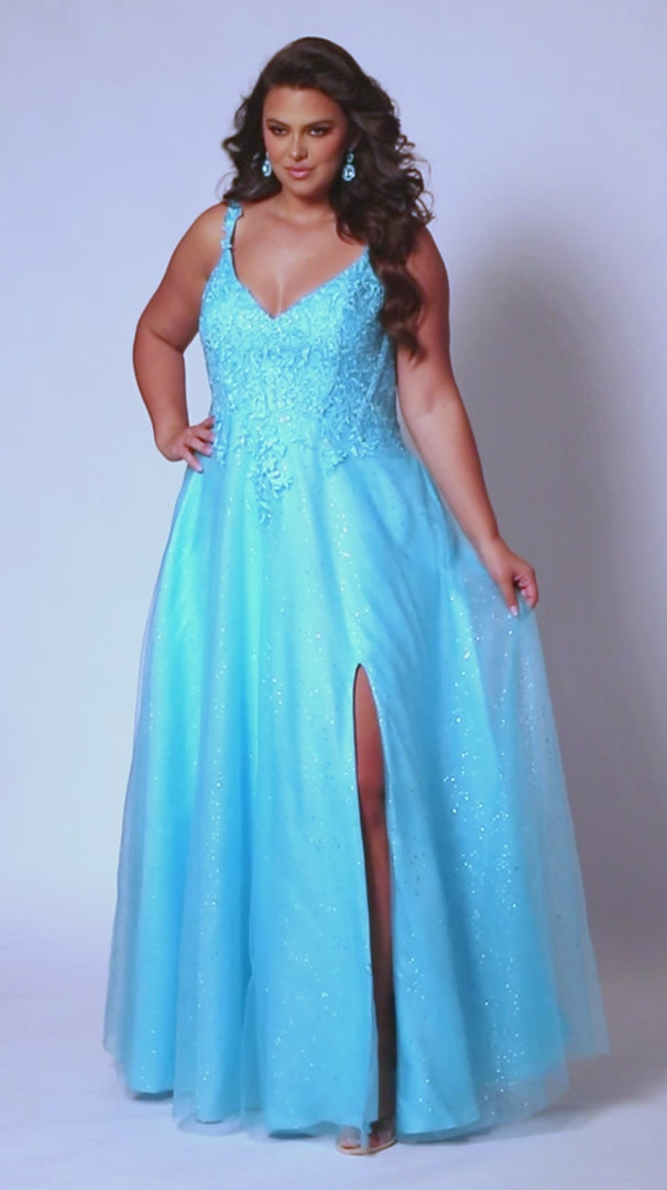 Look stunning at any formal event in a Sydneys Closet SC7384 Long Prom Dress. This A-line prom gown features a V-neckline with a scoop back, slit, pockets and a floor-length skirt complete the look. Ideal for plus size formal occasions. Pump up the fun factor at Prom 2024 when you arrive wearing this sparkly Aline evening dress. 