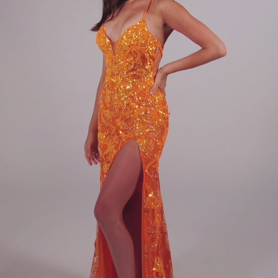 The Ellie Wilde EW35060 is a stunning long prom dress featuring a sheer corset top with intricate sequin designs. The backless design adds a touch of elegance, while the high slit allows for easy movement. Step out in style and make a statement with this formal gown.  Sizes: 00-20  Colors: ORANGE, LIGHT BLUE, HOT PINK
