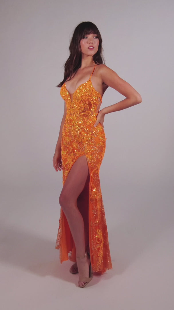 The Ellie Wilde EW35060 is a stunning long prom dress featuring a sheer corset top with intricate sequin designs. The backless design adds a touch of elegance, while the high slit allows for easy movement. Step out in style and make a statement with this formal gown.  Sizes: 00-20  Colors: ORANGE, LIGHT BLUE, HOT PINK