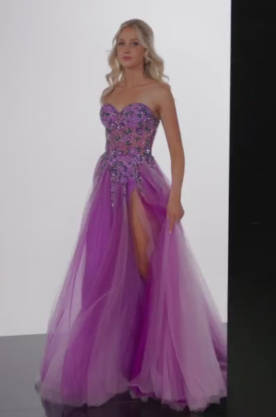 The Jovani 23710 is an enchanting prom dress from the formal collection, designed to make a lasting impression at your special event. This stunning gown is made from delicate tulle, imparting an ethereal and graceful quality to your overall look.  In terms of style, the dress takes on a classic A-line silhouette, known for its universally flattering design that complements various body types.