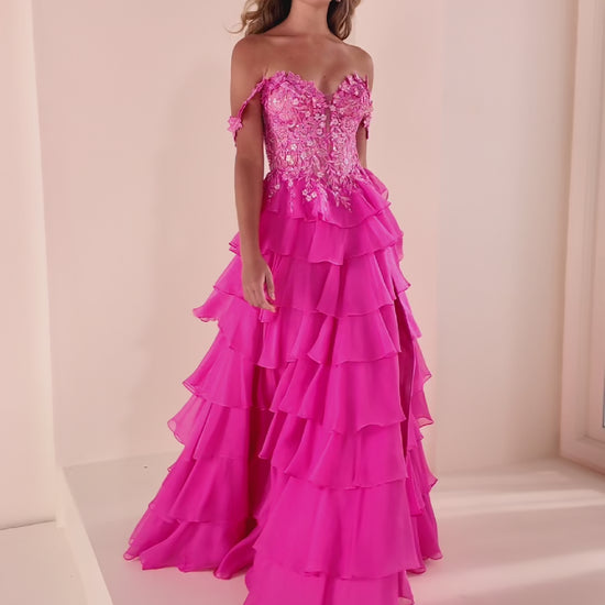 Elevate your prom night in this stunning Ellie Wilde EW37108 gown. Crafted from luxurious chiffon with intricate lace appliqué and shimmering sequin details, this long A-line dress features a sweetheart neckline and sleeveless silhouette for timeless elegance. The structured corset bodice with basque waistline creates a flattering, defined shape, while tiered ruffles add romantic movement. Detachable shoulder straps offer styling versatility, and the lace-up back provides a secure, customizable fit. A taste