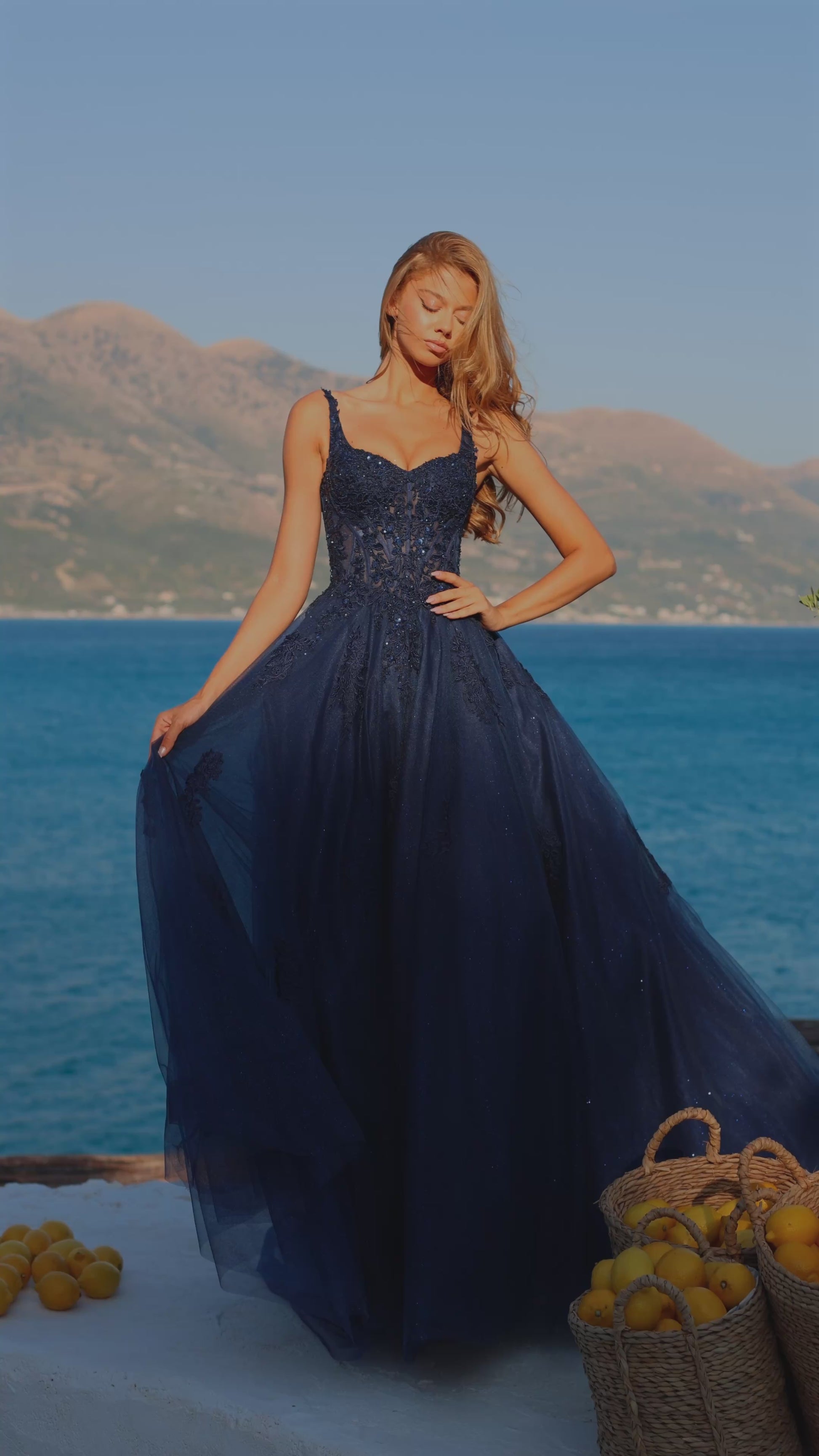 Elevate your formal event presence with the Amarra 89429, a stunning ballgown that seamlessly blends sophistication with dramatic elegance. This A-line silhouette features an intricately embellished sheer lace corset bodice that creates a refined, structured look while the voluminous tulle skirt provides the timeless grandeur expected of a show-stopping prom dress. The delicate lace detailing catches light beautifully, ensuring you command attention throughout the evening. Perfect for prom, pageants, or any