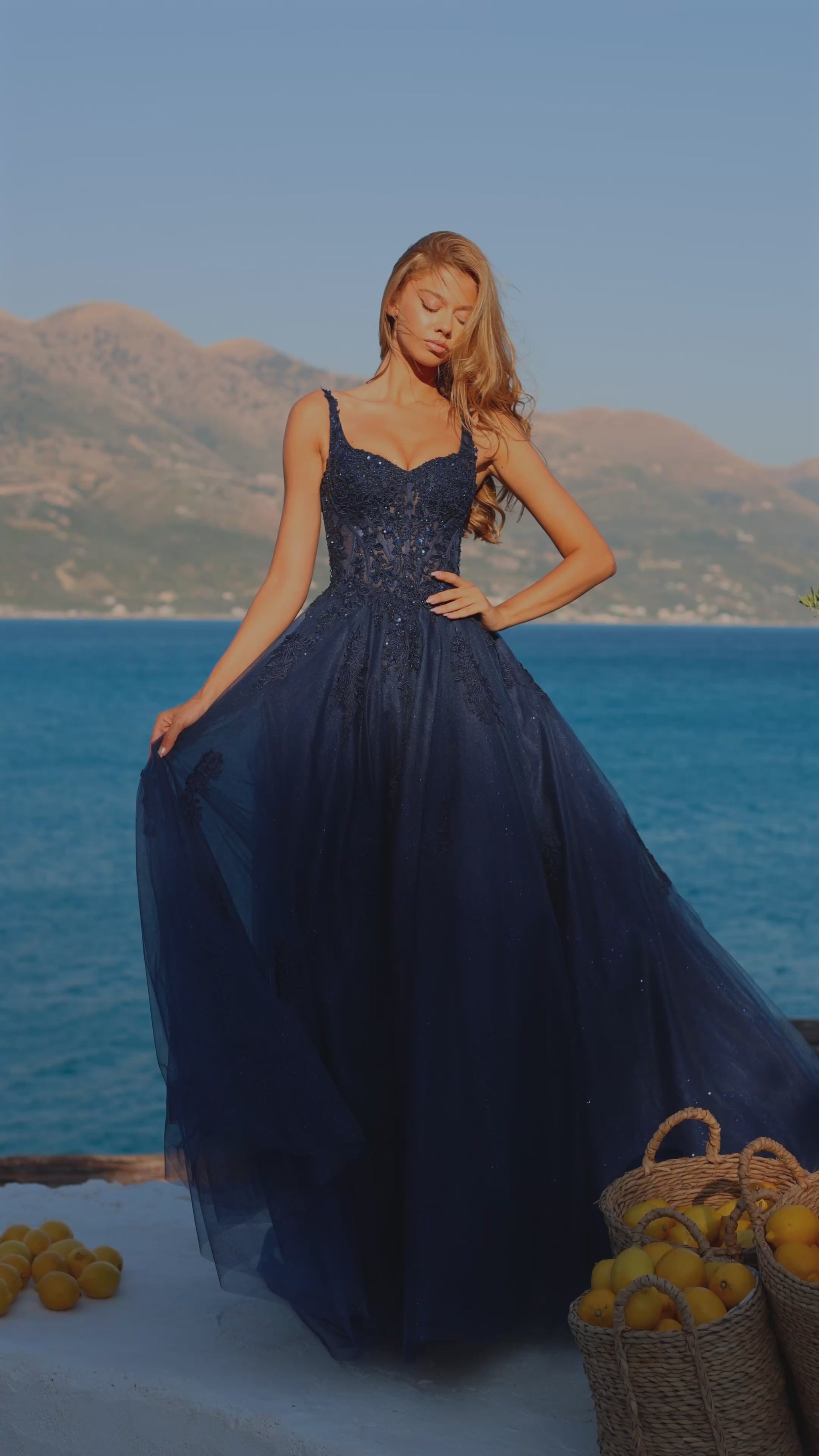 Elevate your formal event presence with the Amarra 89429, a stunning ballgown that seamlessly blends sophistication with dramatic elegance. This A-line silhouette features an intricately embellished sheer lace corset bodice that creates a refined, structured look while the voluminous tulle skirt provides the timeless grandeur expected of a show-stopping prom dress. The delicate lace detailing catches light beautifully, ensuring you command attention throughout the evening. Perfect for prom, pageants, or any