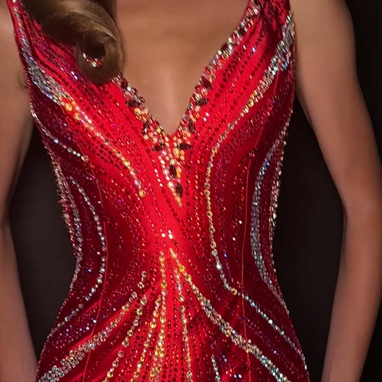 Make a statement in ASHLEYlauren Style 12253. This fully beaded evening gown features a flattering v-neckline and fitted silhouette. The heat set stone pattern creates a stunning swirl effect that accentuates your curves. The look is finished with a high slit and low open back for added drama.

Available in Champagne, Emerald, Gold, Ocean, Pink, Purple, Red, Royal
Ideal for Prom, Formal Galas, Special Occasions, Pageant Competitions and Red Carpet Events.
Featuring a V-Neckline, High Slit, and Open Back

As