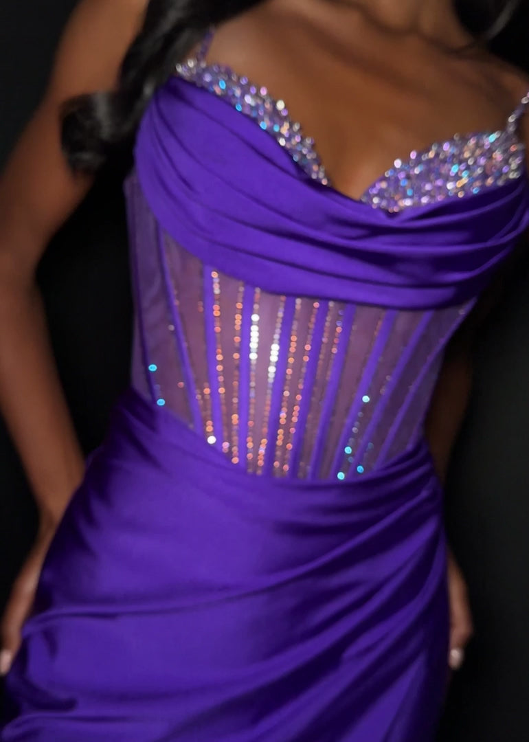 Elevate your evening with the Ashley Lauren 4864, a short fitted homecoming dress that combines elegance and allure. Crafted from smooth jersey fabric, this cocktail gown features a flattering corset bodice adorned with sparkling crystals, enhancing your silhouette with refined glamour. The tasteful slit adds a touch of sophistication and movement, making it perfect for memorable occasions. Designed to highlight your confidence and style, this dress is an exquisite choice for your next special event. Make a