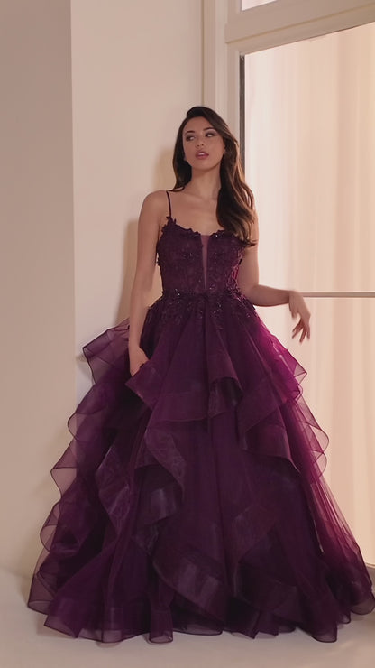 Step into elegance with the Ellie Wilde EW36225 Sheer Lace Corset Ball Gown. Featuring a stunning sheer lace bodice and layered corset, this formal evening gown is perfect for prom or any special occasion. Make a statement in this luxurious and exclusive dress, designed to make you feel like a work of art.