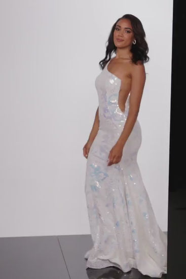 Experience sheer elegance with the Jovani 32580 Long Prom Dress. Its sequin embellishments and one shoulder design create a stunning mermaid silhouette, while the sheer side train adds a touch of drama. Perfect for your next formal event or pageant, this gown is sure to turn heads. Bring sophistication and glamour to your special occasion with the Jovani 32580 Long Prom Dress. 