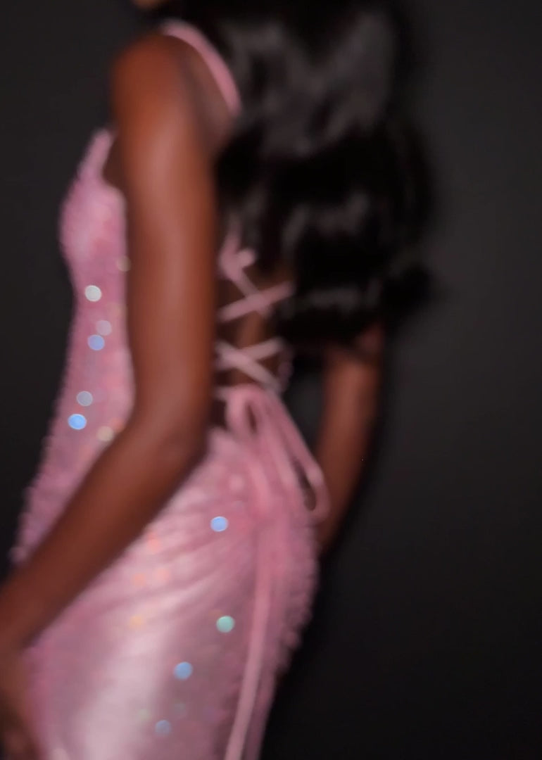 Ashley Lauren 12357 Make an entrance in ASHLEYlauren Style 12357 pearl crystal prom dress. This gown features full pearl beading, a fitted silhouette, lace up back and sleek sweetheart neckline. The vertical beadwork accentuates the waist and elongates the figure.