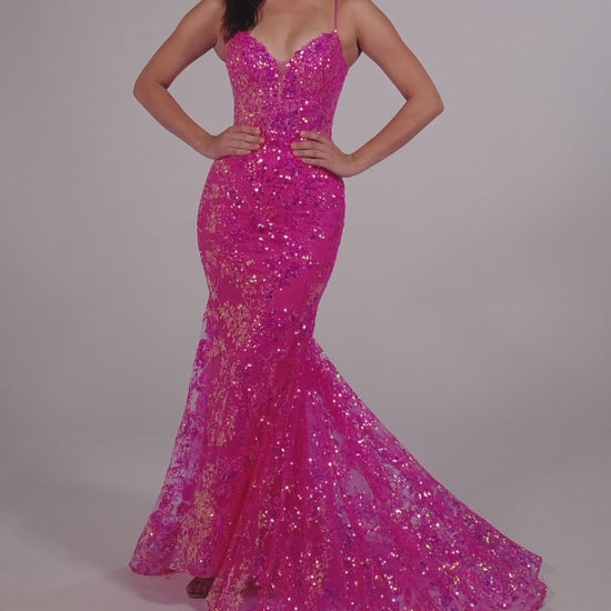 Make a stunning appearance at your next formal event in this Ellie Wilde EW35013 Long Fitted Sequin Mermaid Prom Dress. Crafted from an exquisite combination of Embroidered Tulle, Glitter Tulle, and Sequins, this beautiful dress includes a plunging Sweetheart neckline, a corset bodice with a lace-up back, and a trumpet silhouette for the perfect fit. The Natural waistline and Sleeveless design complete the look.  COLOR: BLACK, MIDNIGHT, LIGHT BLUE, LILAC, HOT PINK SIZE: 00 - 20