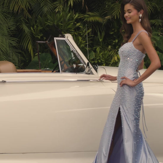 Ashley Lauren 12357 Make an entrance in ASHLEYlauren Style 12357 pearl crystal prom dress. This gown features full pearl beading, a fitted silhouette, lace up back and sleek sweetheart neckline. The vertical beadwork accentuates the waist and elongates the figure.