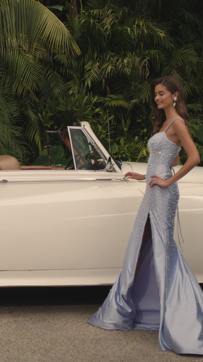 Ashley Lauren 12357 Make an entrance in ASHLEYlauren Style 12357 pearl crystal prom dress. This gown features full pearl beading, a fitted silhouette, lace up back and sleek sweetheart neckline. The vertical beadwork accentuates the waist and elongates the figure.