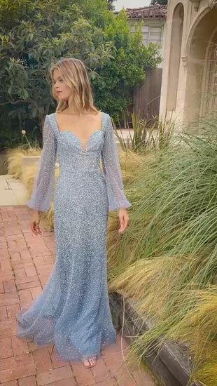 Ladivine A1173 Dress features a long puff-sleeve design for a contemporary mother-of-gown look. This formal evening dress is the perfect choice for special occasions. This fit and flare gown is a stunning long sleeve choice
